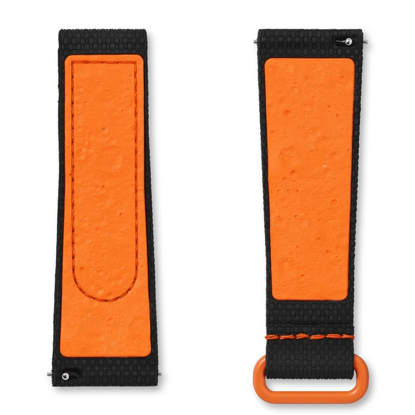 MoonSwatch de caucho negro/naranja